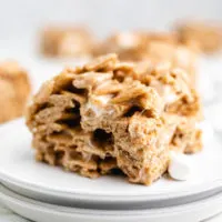 Side view of a cereal bar on a plate.