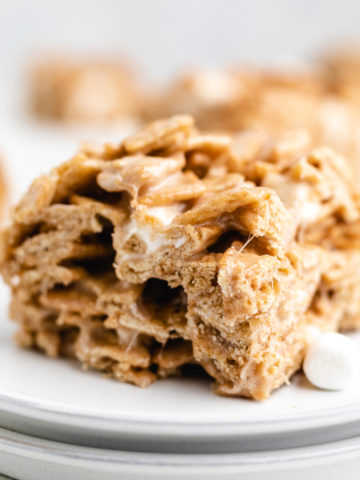 Side view of a cereal bar on a plate.