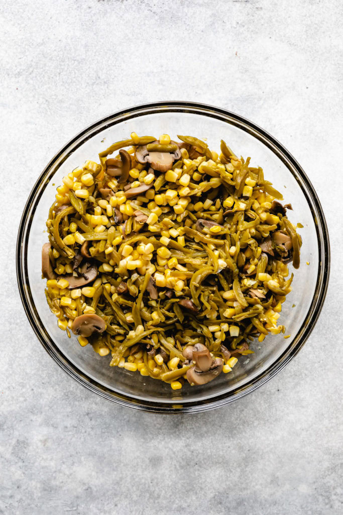 Green beans, corn and mushrooms in a bowl.