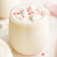 Hot chocolate in a glass with marshmallows.