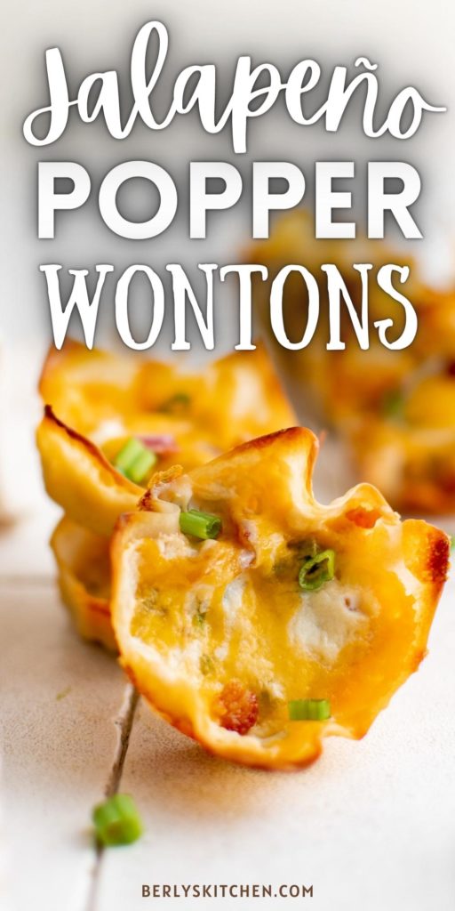 Close up view of jalapeno wonton cups with green onions and bacon.