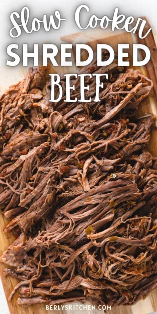 Close up view of slow cooker shredded beef.