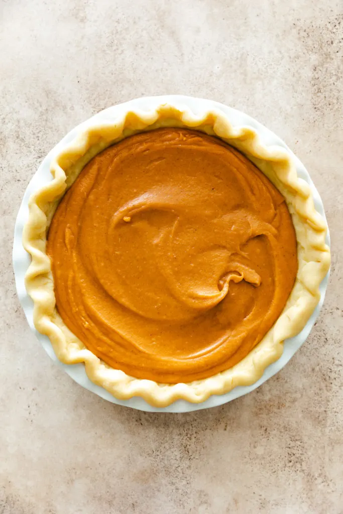 Unbaked pie in a pie crust.
