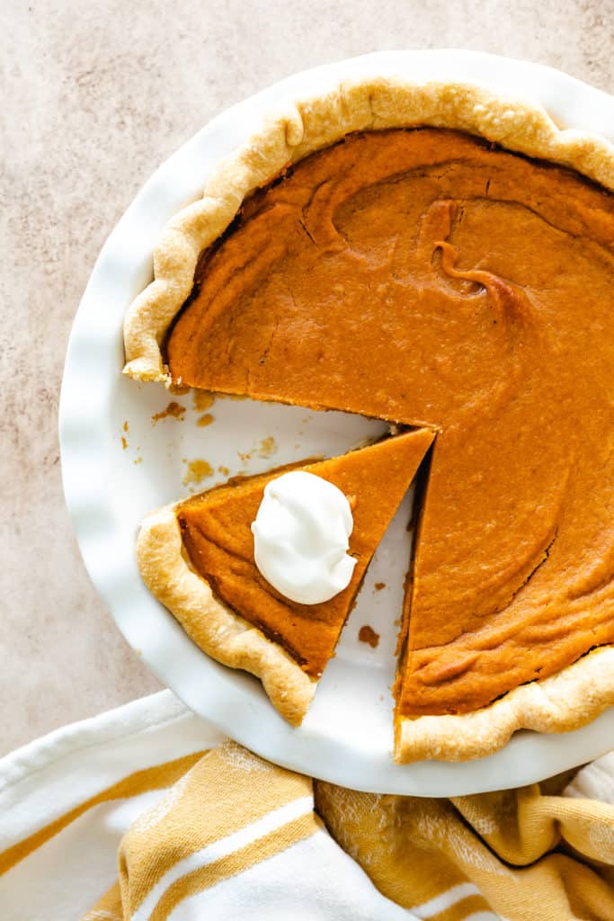 Top down view of sweet potato pie with whipped potato pie.