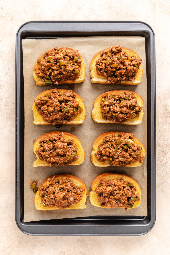 Sloppy joe mix on top of garlic bread.