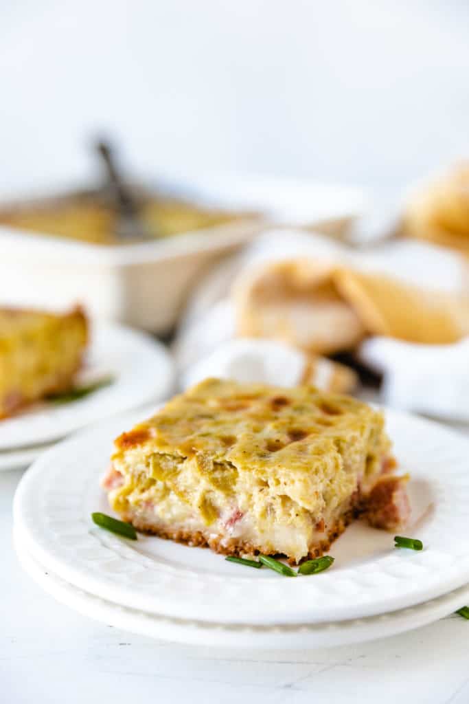 Ham and chile bisquick breakfast casserole on a white plate.