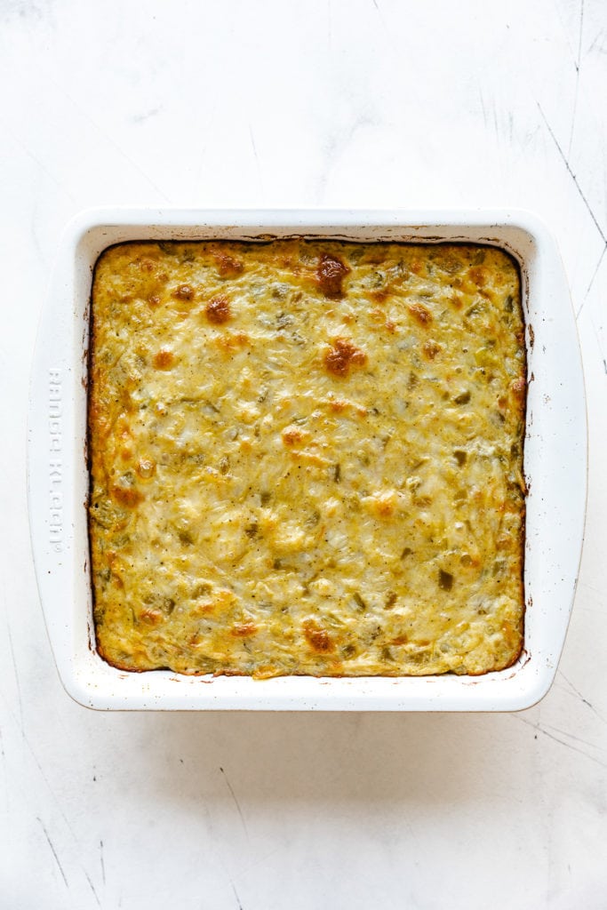 Top down view of a casserole in a white pan.