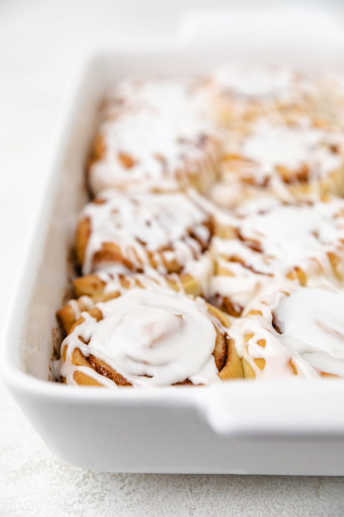 Side view of a pan of sweet breakfast rolls.