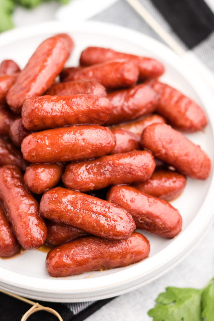 Top down view of a plate of little smokies.