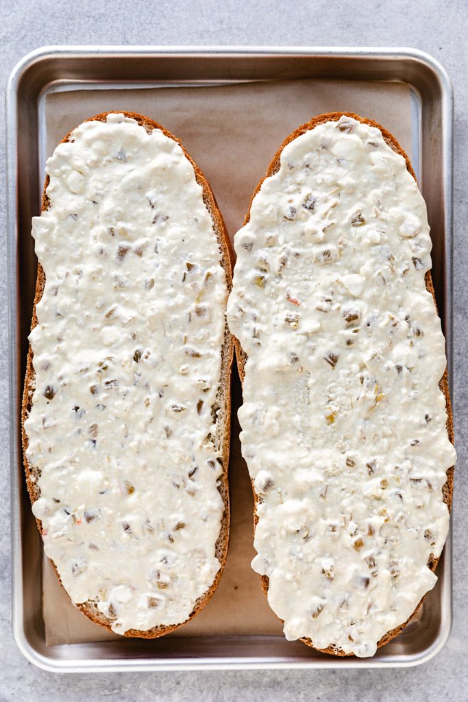 Mayo, cream cheese mixture spread over French bread.