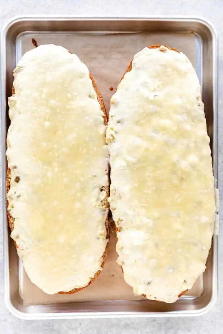 Melted cheese on green chile cheese bread.