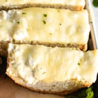 Close up view of cheesy green chile bread.