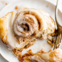 Close up view of a puff pastry cinnamon roll.