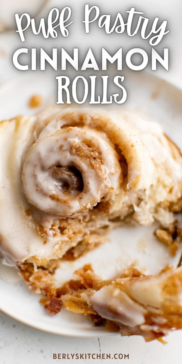 Top down view of a cinnamon roll on a plate.