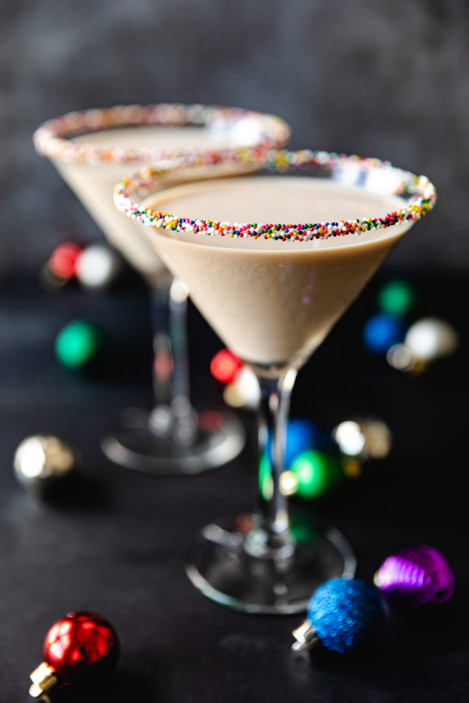 Close up view of two martinis with sprinkles.