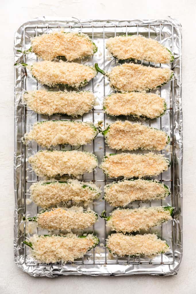 Breadcrumbs on a baking sheet.