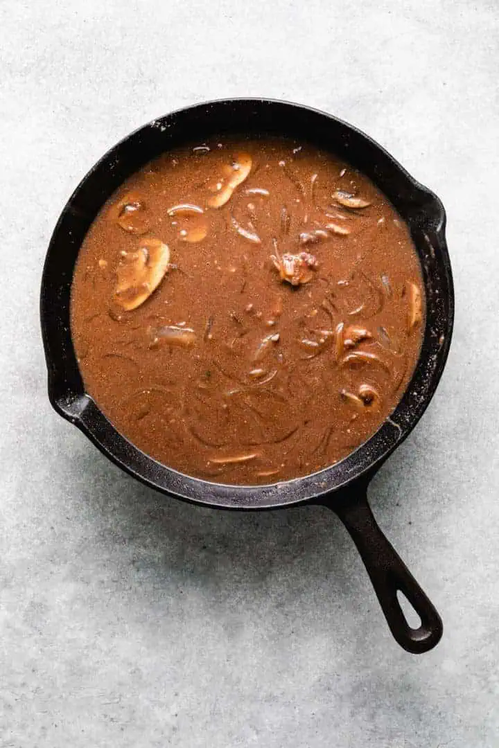 Mushroom beef sauce in cast iron.