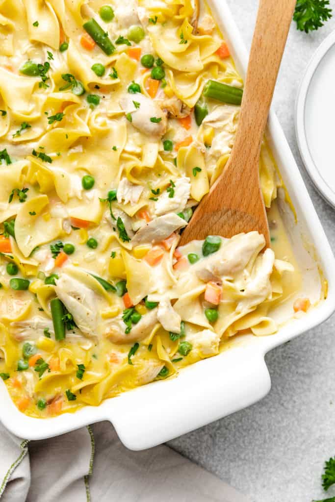 Top down view of chicken casserole in a white dish.