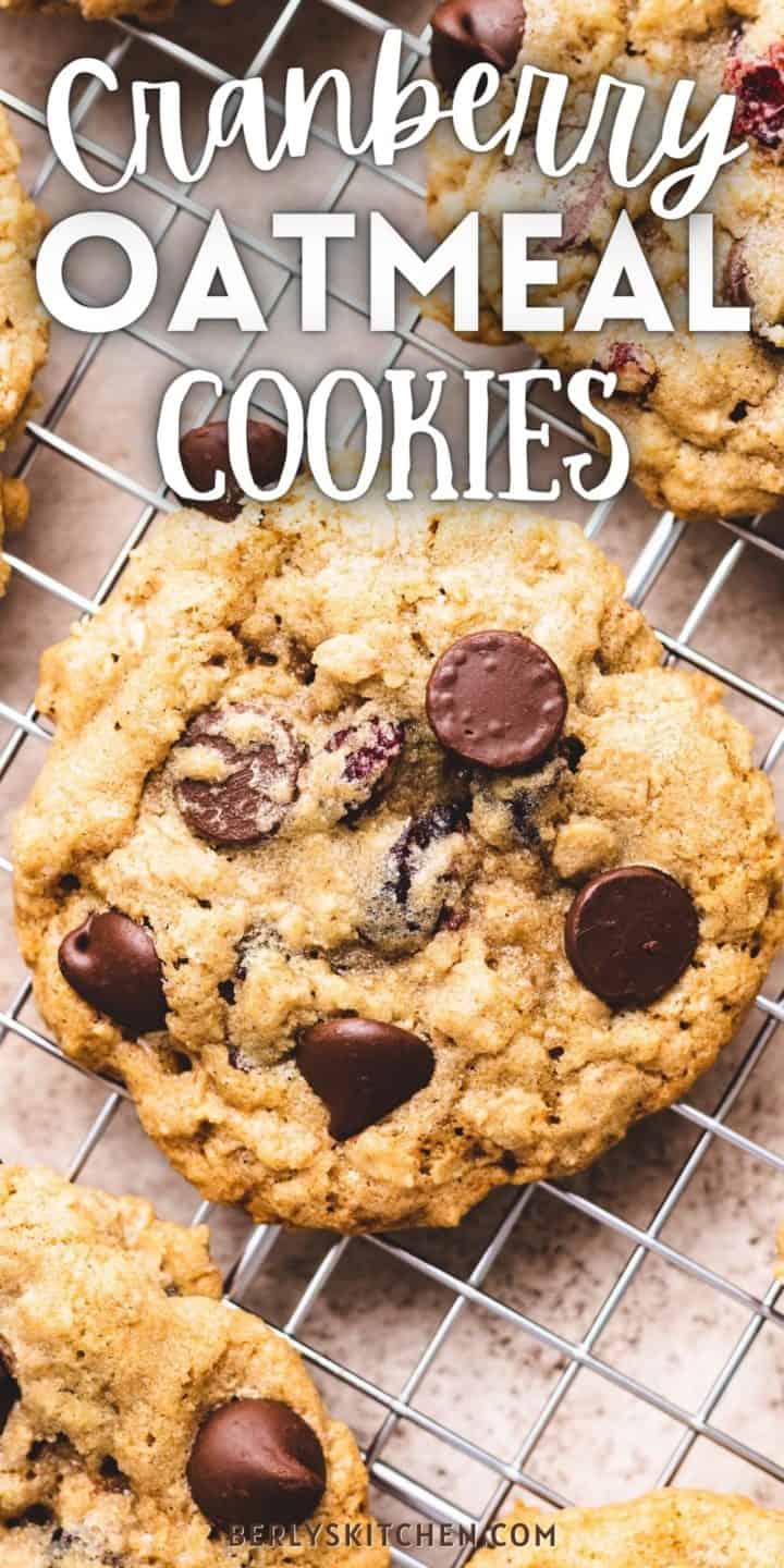 Top down view of cranberry oatmeal cookies on a wire rack.