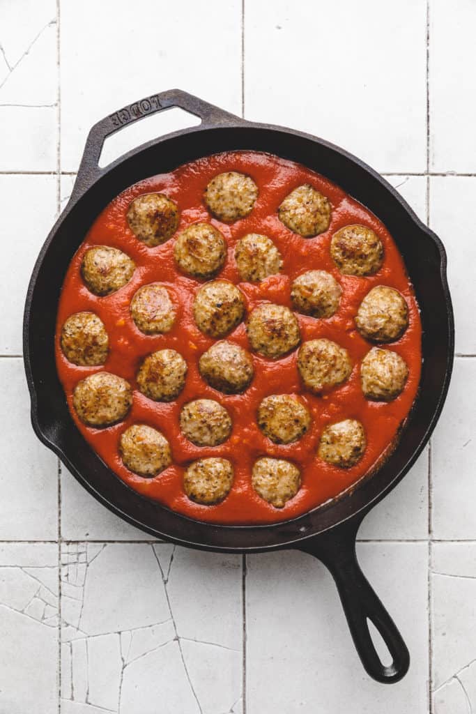 Cooked meatballs in a marinara.