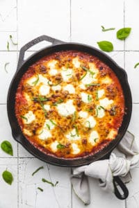 Fresh basil sprinkled over an easy baked casserole with meatballs.