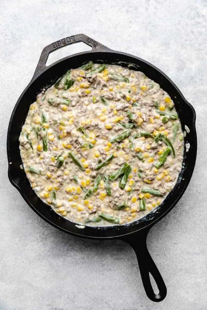 Ground beef casserole with corn and green beans.