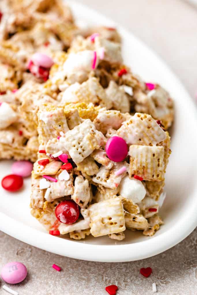 Close up view of a chex cereal bar on a white plate.