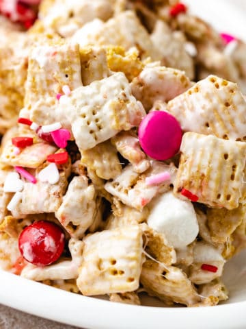 Close up view of Valentine's Chex Cereal Bars on a white dish.
