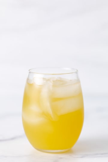 Lime juice added to rum and pineapple juice.
