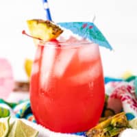 Close up view of an umbrella in a beach drink.