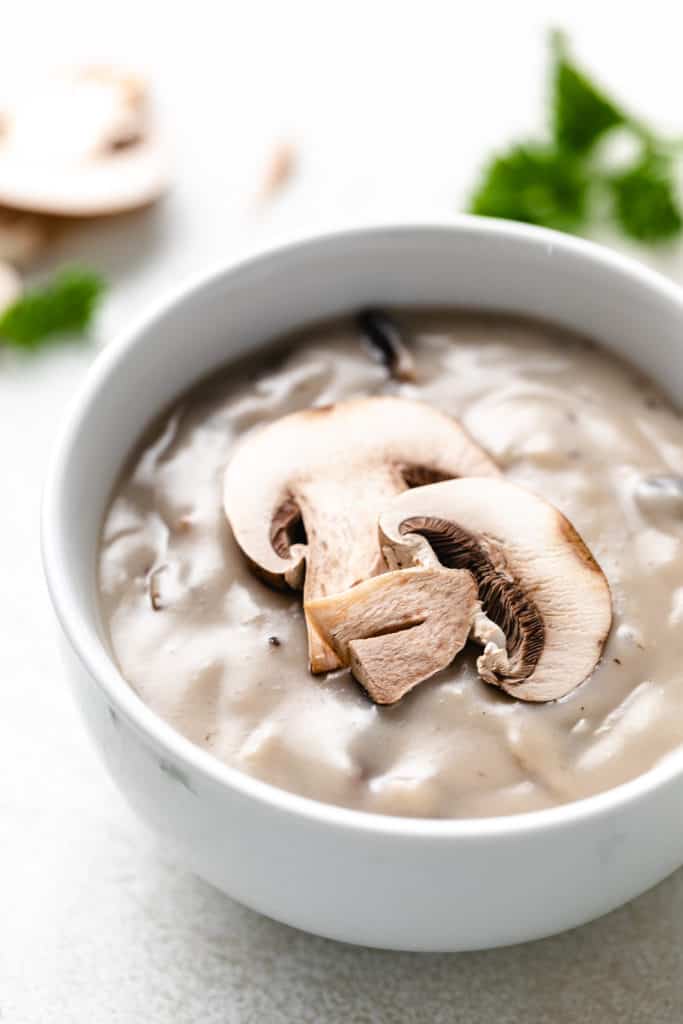 Close up view of a bowl of cream of mushroom soup alternative.