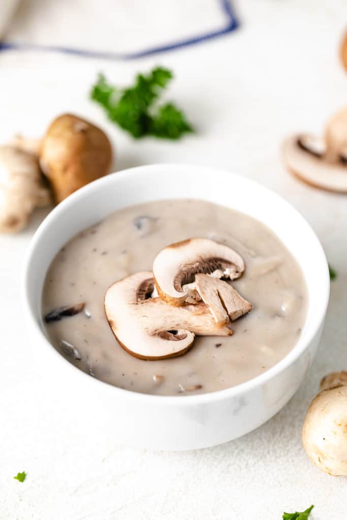 Cream of mushroom soup replacement in a white dish.