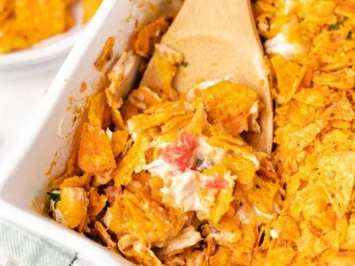 Close up view of chicken casserole in a baking dish.