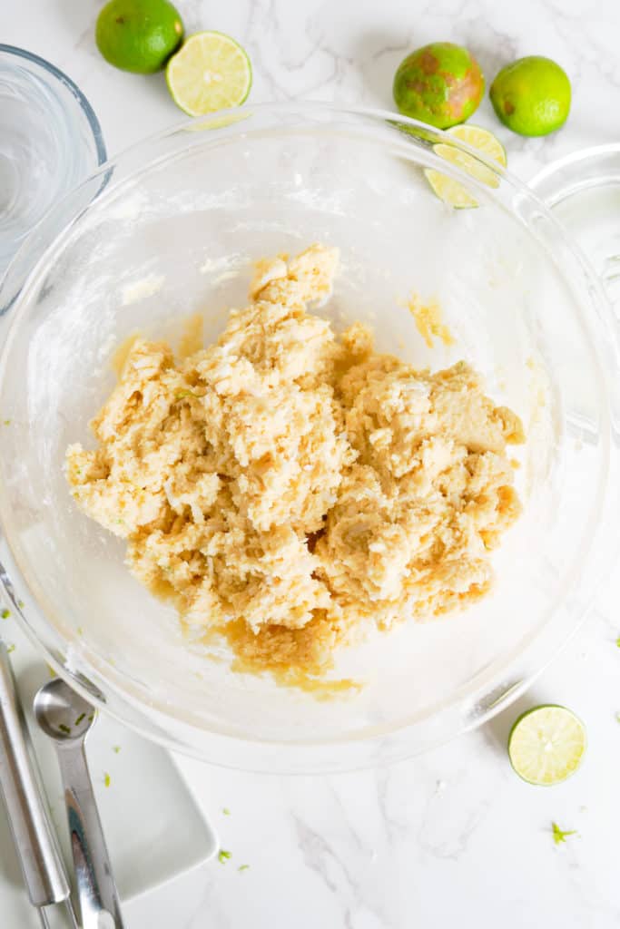 Sugar cookie dough in a glass bowl.