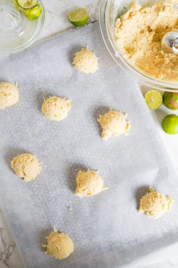 Unbaked cookie dough on parchment paper.