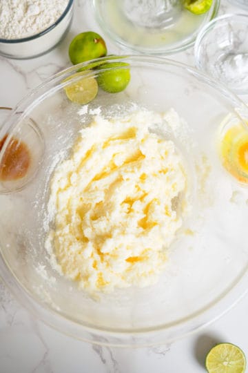 Creamed butter and sugar in a bowl.