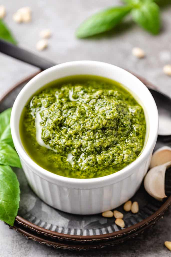Side view of pesto in a dish.