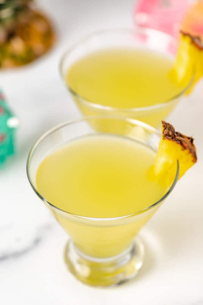 Angled view of a pineapple juice cocktail.