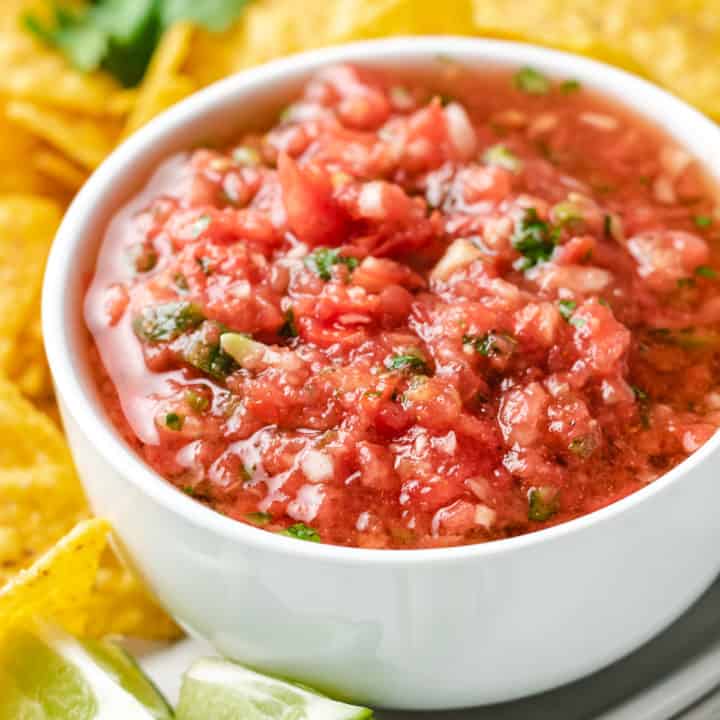 Close up view of a bowl of salsa.
