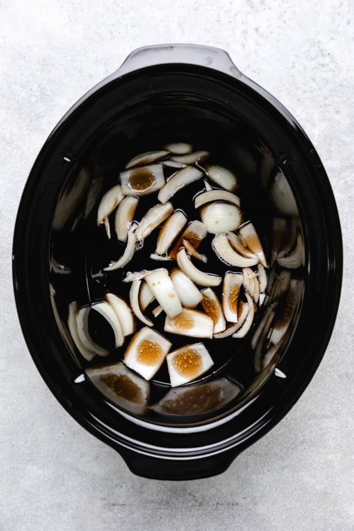 Dr. pepper and onions in slow cooker.