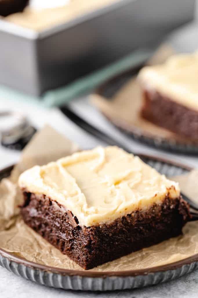 Fudgy guinness brownie on a plate.