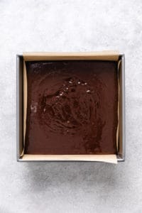 Brownie batter in a baking dish.
