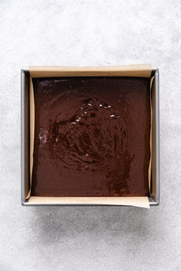 Brownie batter in a baking dish.