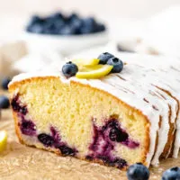 Side view of a loaf of blueberry bread.