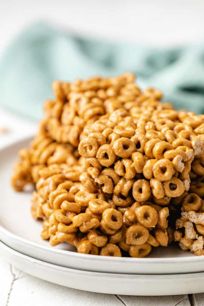 Two plates stacked with cheerio treats.