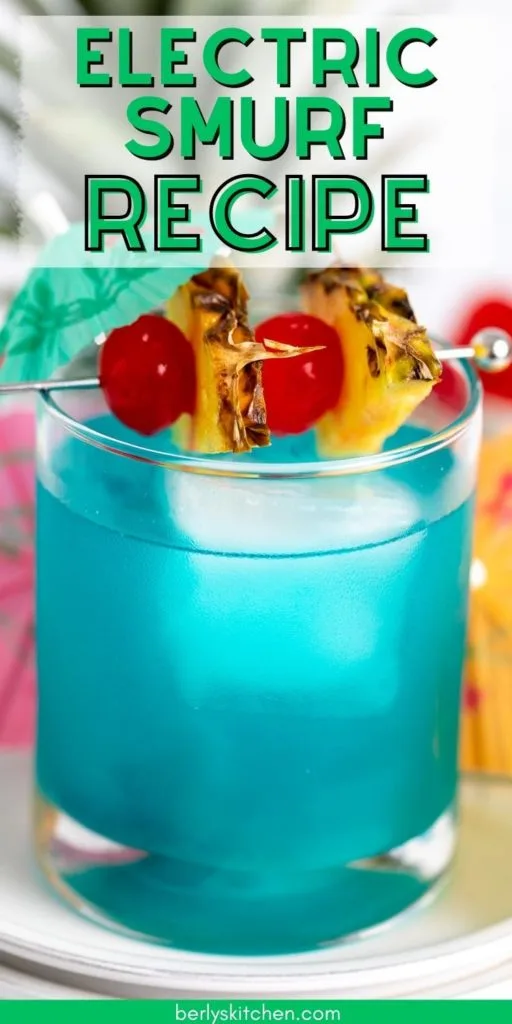 Cocktail glass filled with a blue cocktail.