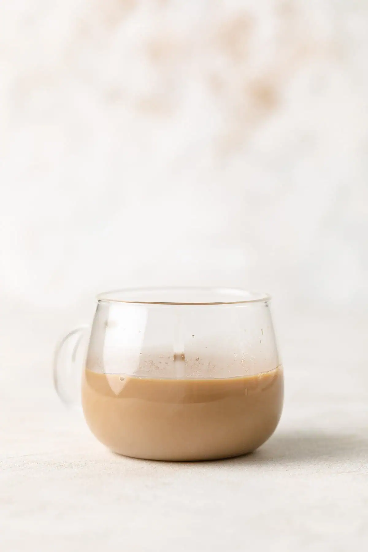 Bailey's Irish cream added to a cup of coffee.