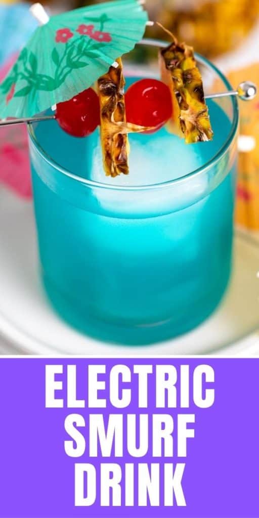 Electric smurf cocktail with cherry and pineapple garnishes.