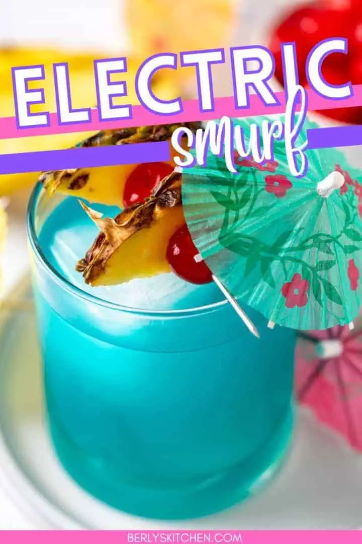 Blue alcoholic drink recipe in a cocktail glass.