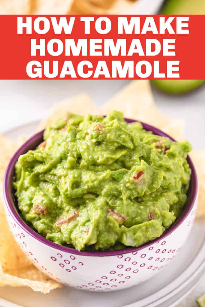 Guacamole dip in a purple and white dish.